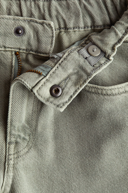 Tapered cotton-blend jeans