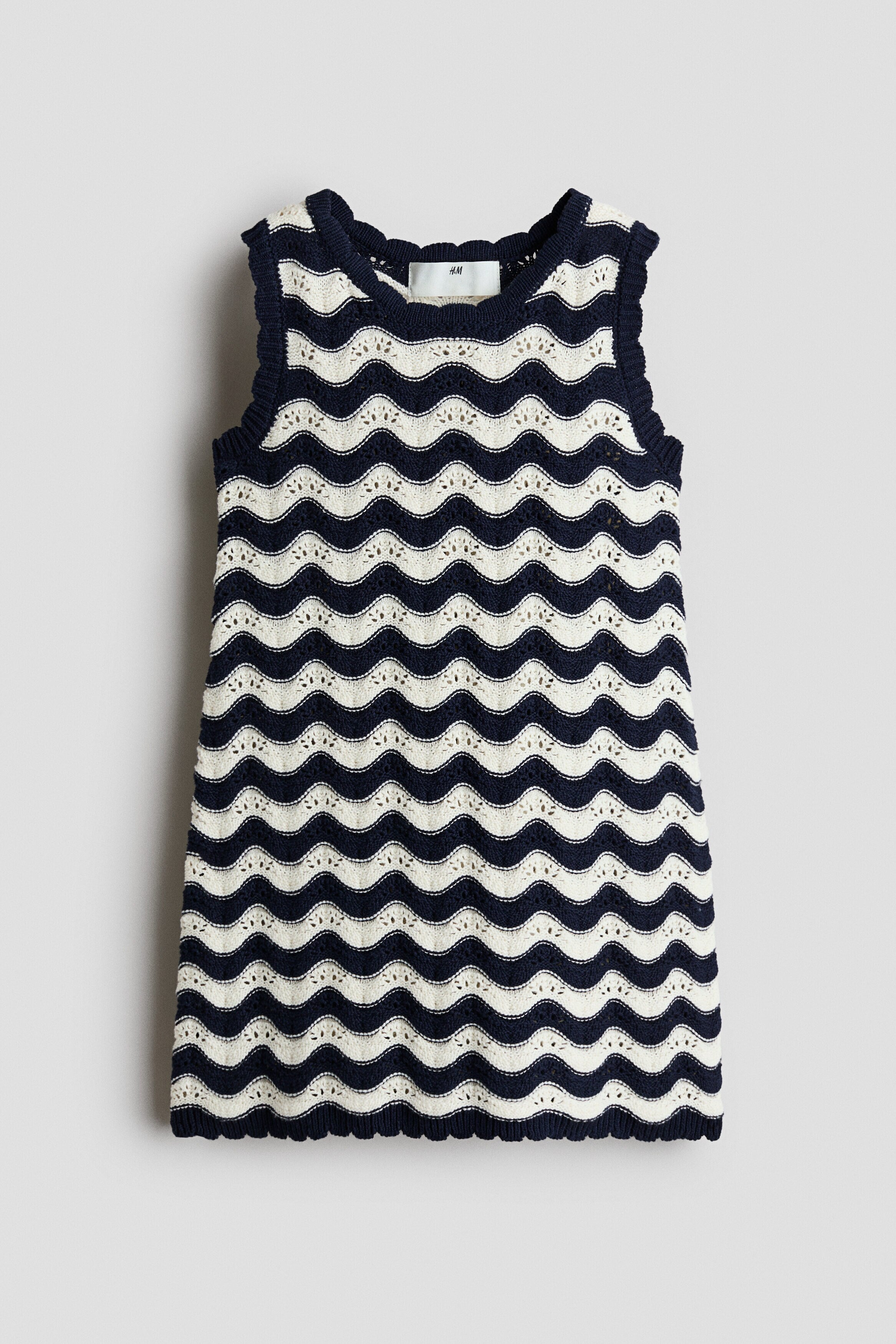Appliquéd hole-knit dress