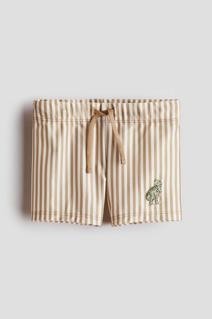 Embroidery-motif swimming trunks - Beige T Rex / 1.5-2 Years