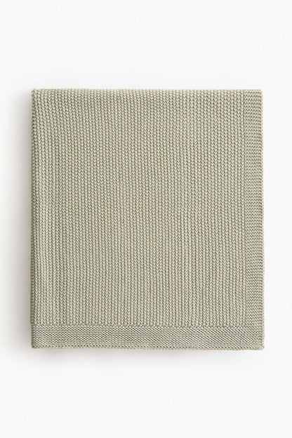Moss-stitched cotton blanket