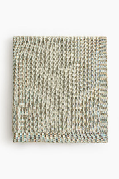 Moss-stitched cotton blanket