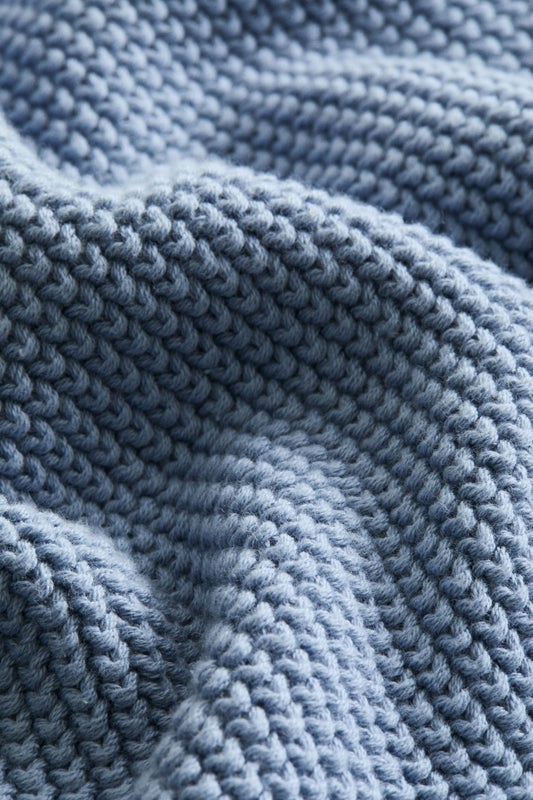 Moss-stitched cotton blanket