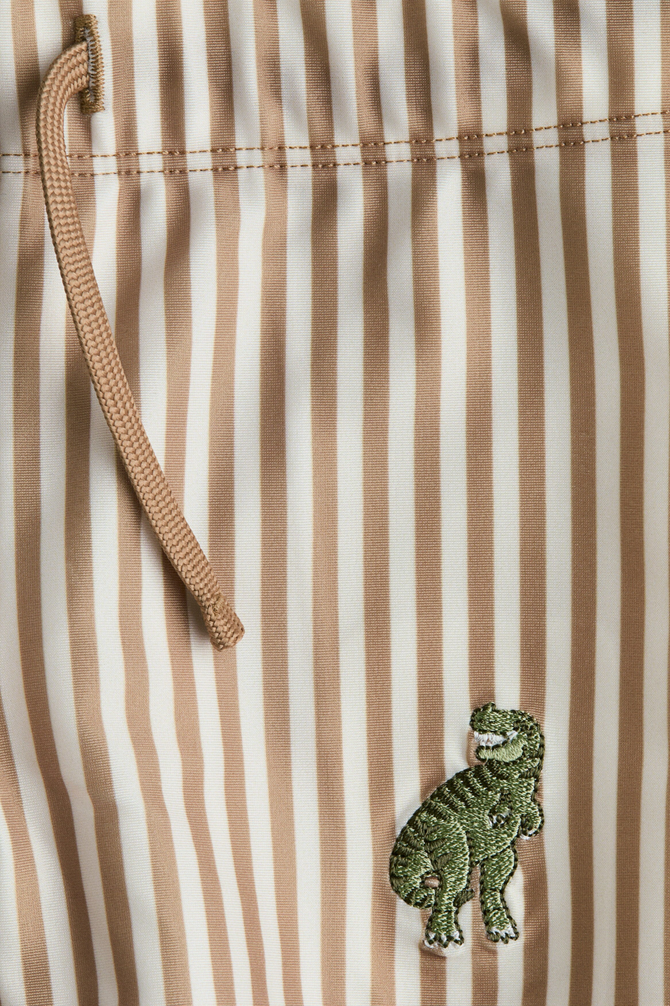 Embroidery-motif swimming trunks