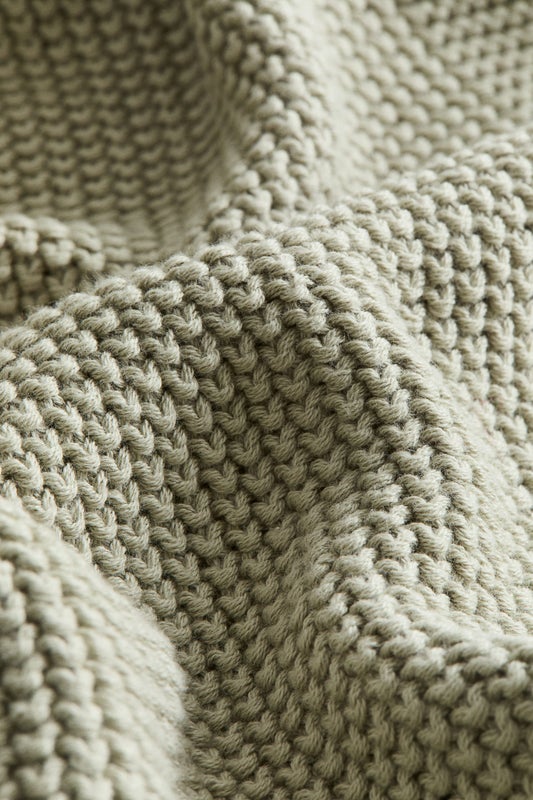 Moss-stitched cotton blanket