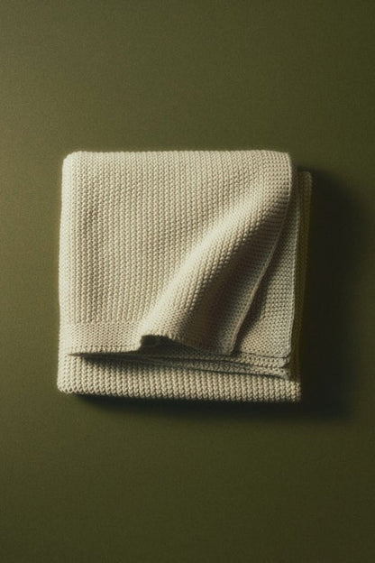 Moss-stitched cotton blanket