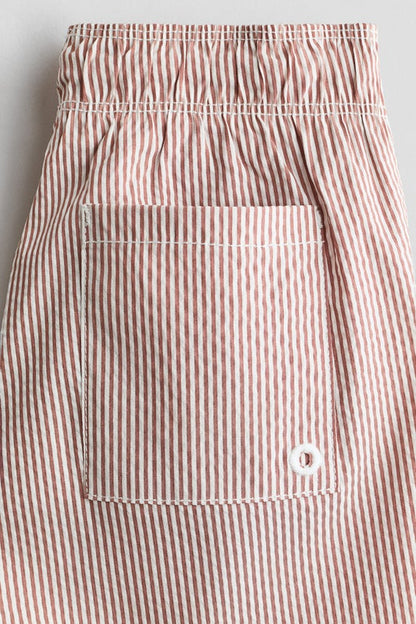 Patterned swim shorts