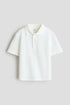 Embroidered-motif piqué polo shirt - White / 1.5-2 Years