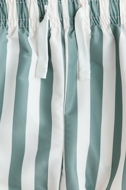 Patterned swim shorts