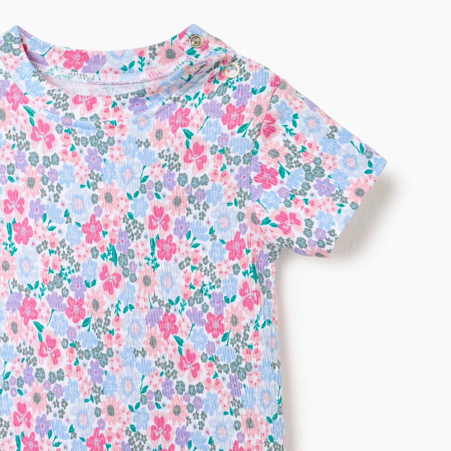 Juniors Floral Print Romper with Short Sleeves and Button Closure