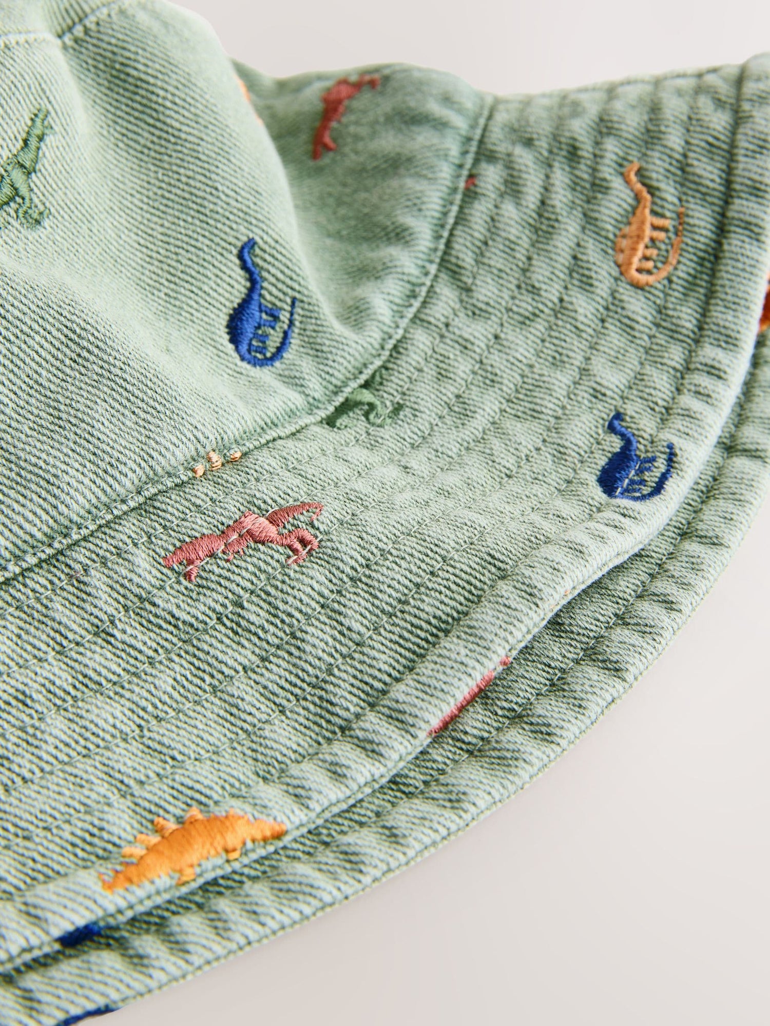 Khaki Green All-Over Embroidered Dinosaur Bucket Hat (3mths-10yrs) - Size 3-9 Months (62-74cm)