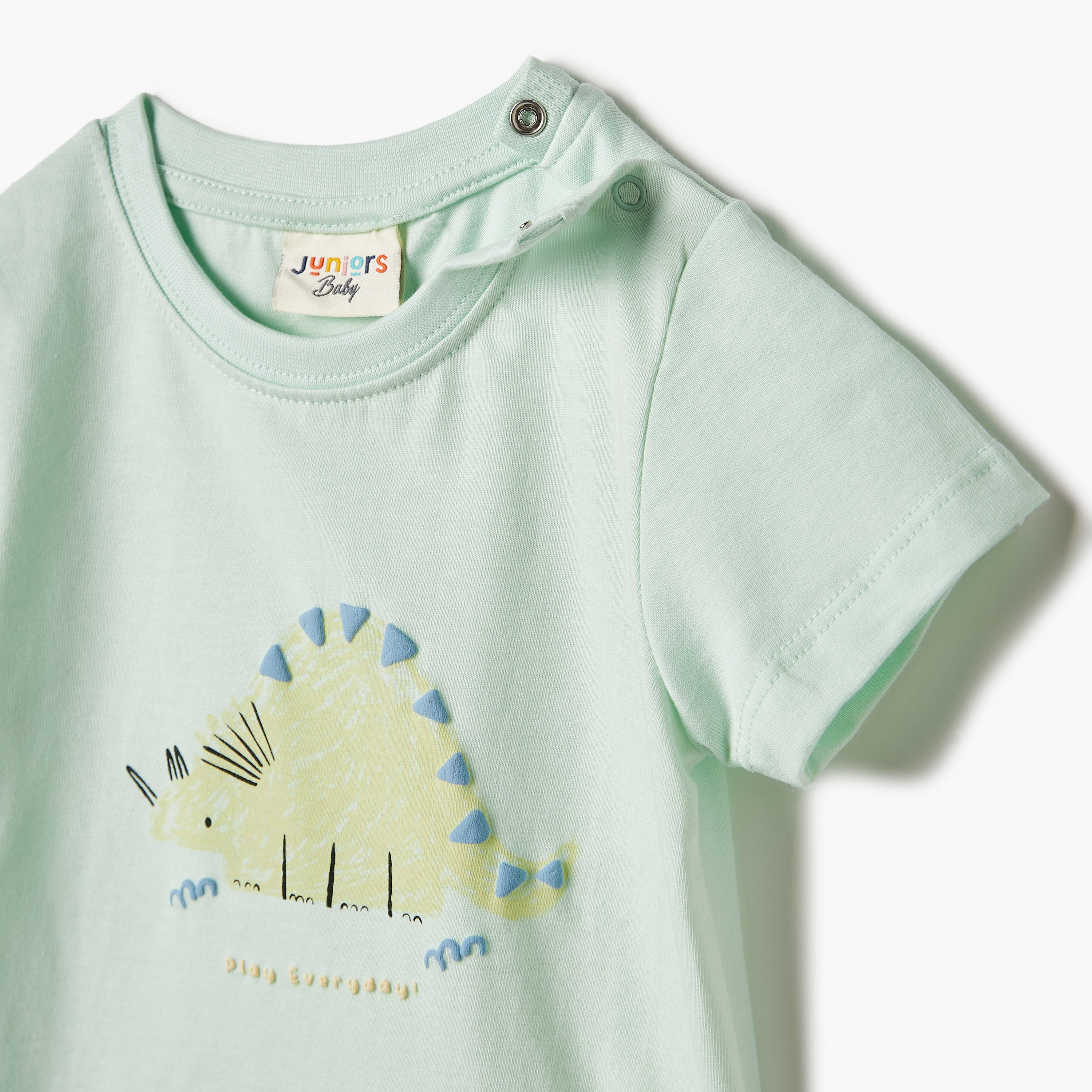 Juniors Graphic Print Crew Neck T-shirt with Short Sleeves and Button Closure