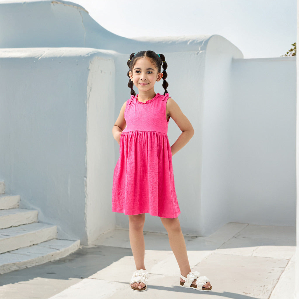 Juniors Textured Sleeveless Dress with Ruffle Trim and Bow Detail
