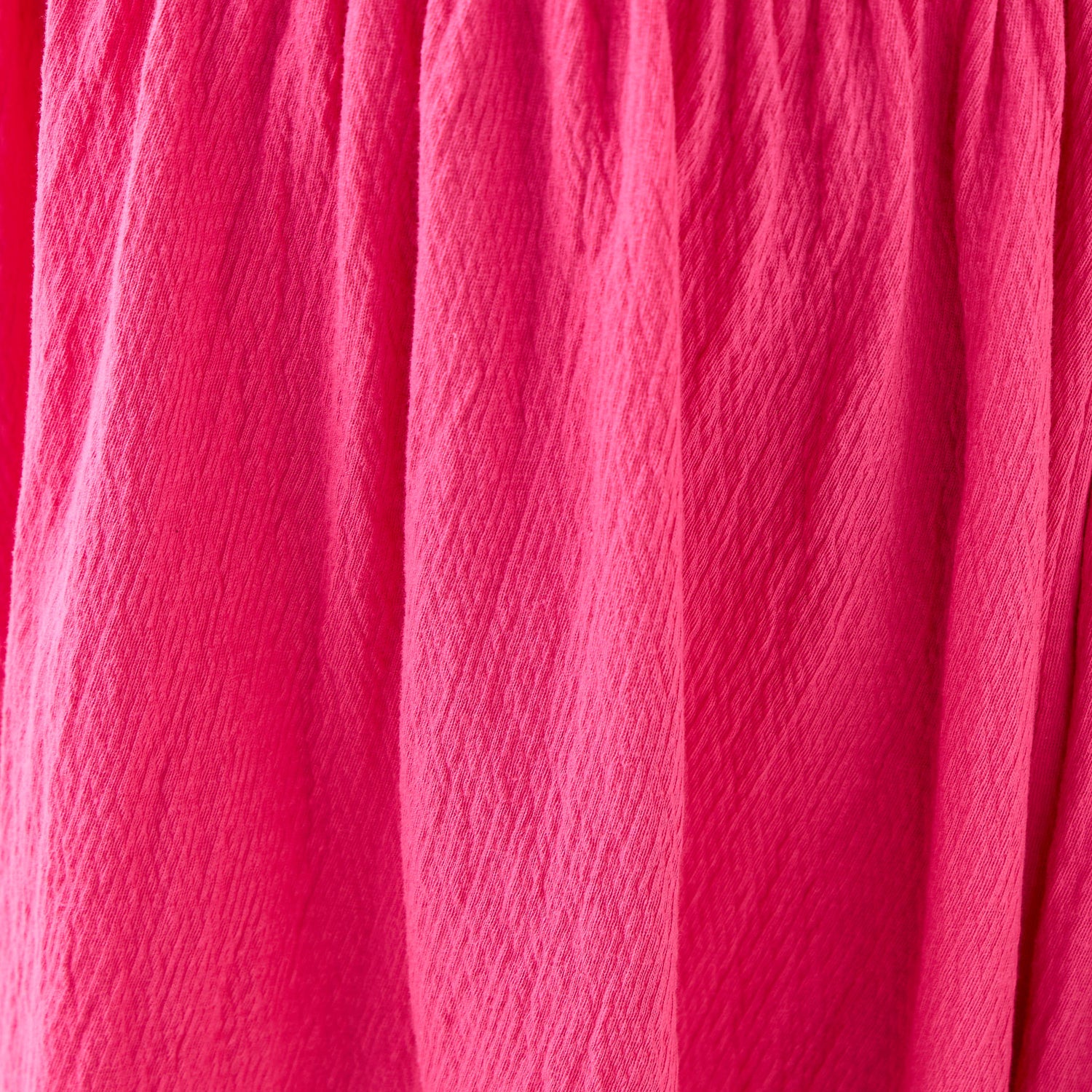 Juniors Textured Sleeveless Dress with Ruffle Trim and Bow Detail
