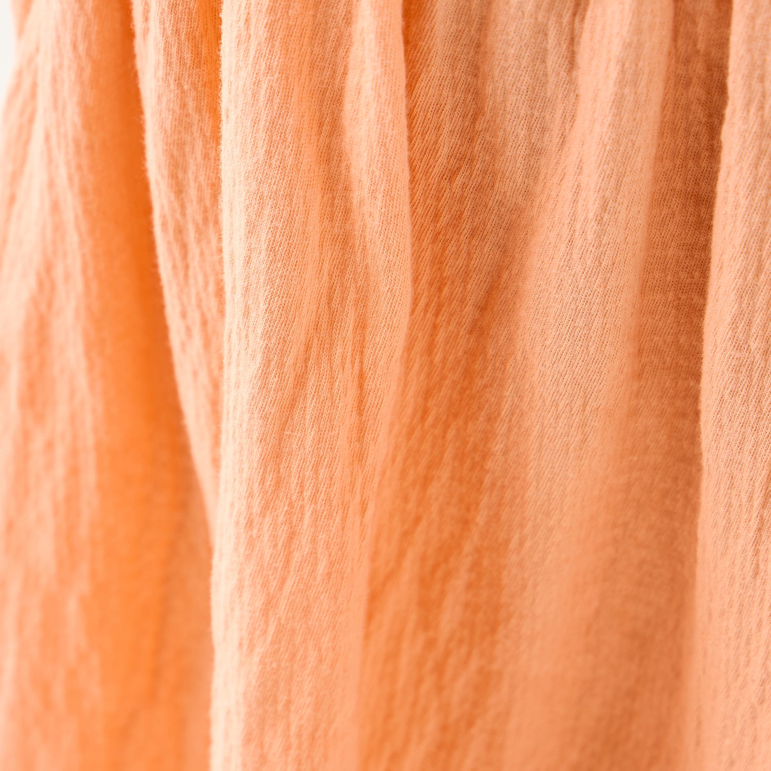 Juniors Textured Sleeveless Dress with Ruffle Trim and Bow Detail