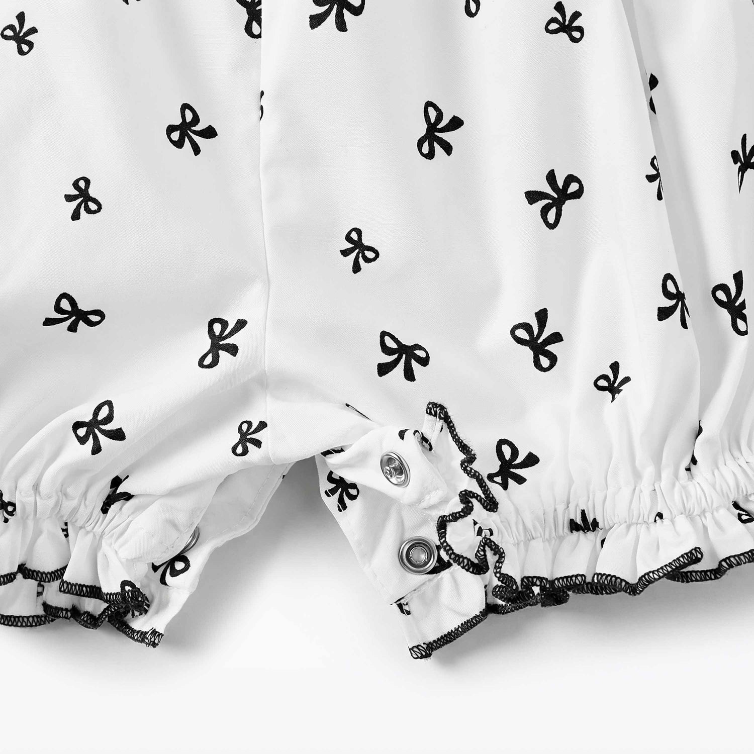 Juniors Square Neck Cap Sleeves Romper with Bow Print