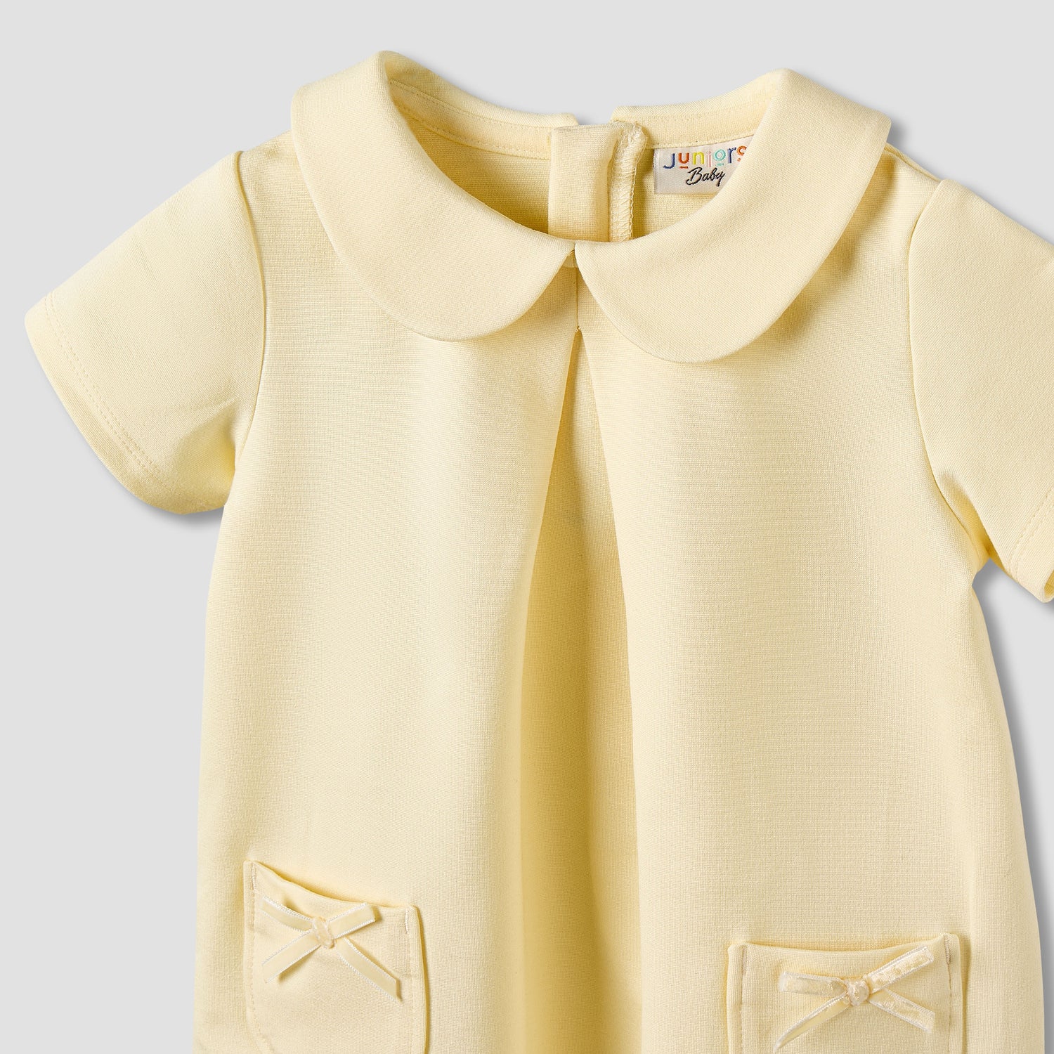 Juniors Peter Pan Collar Short Sleeve Dress with Bow Accent