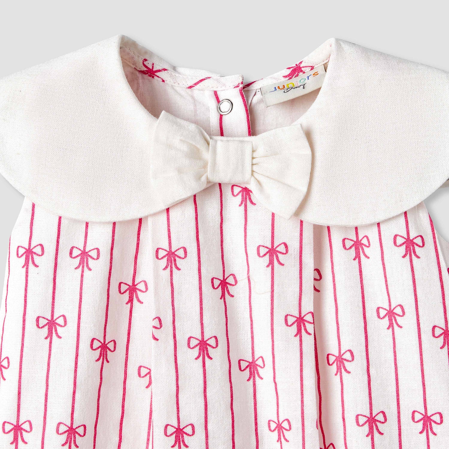 Juniors Peter Pan Collar Sleeveless Romper with Bow Print