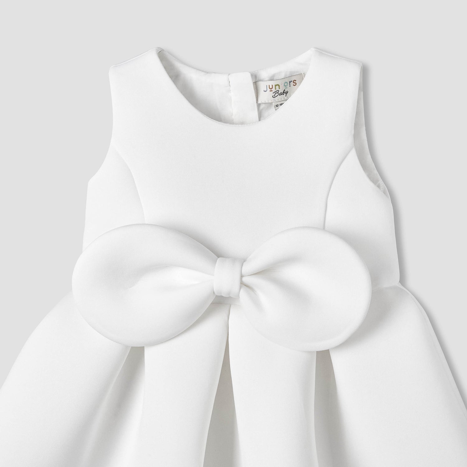 Juniors Round Neck Sleeveless Dress with Bow Accent