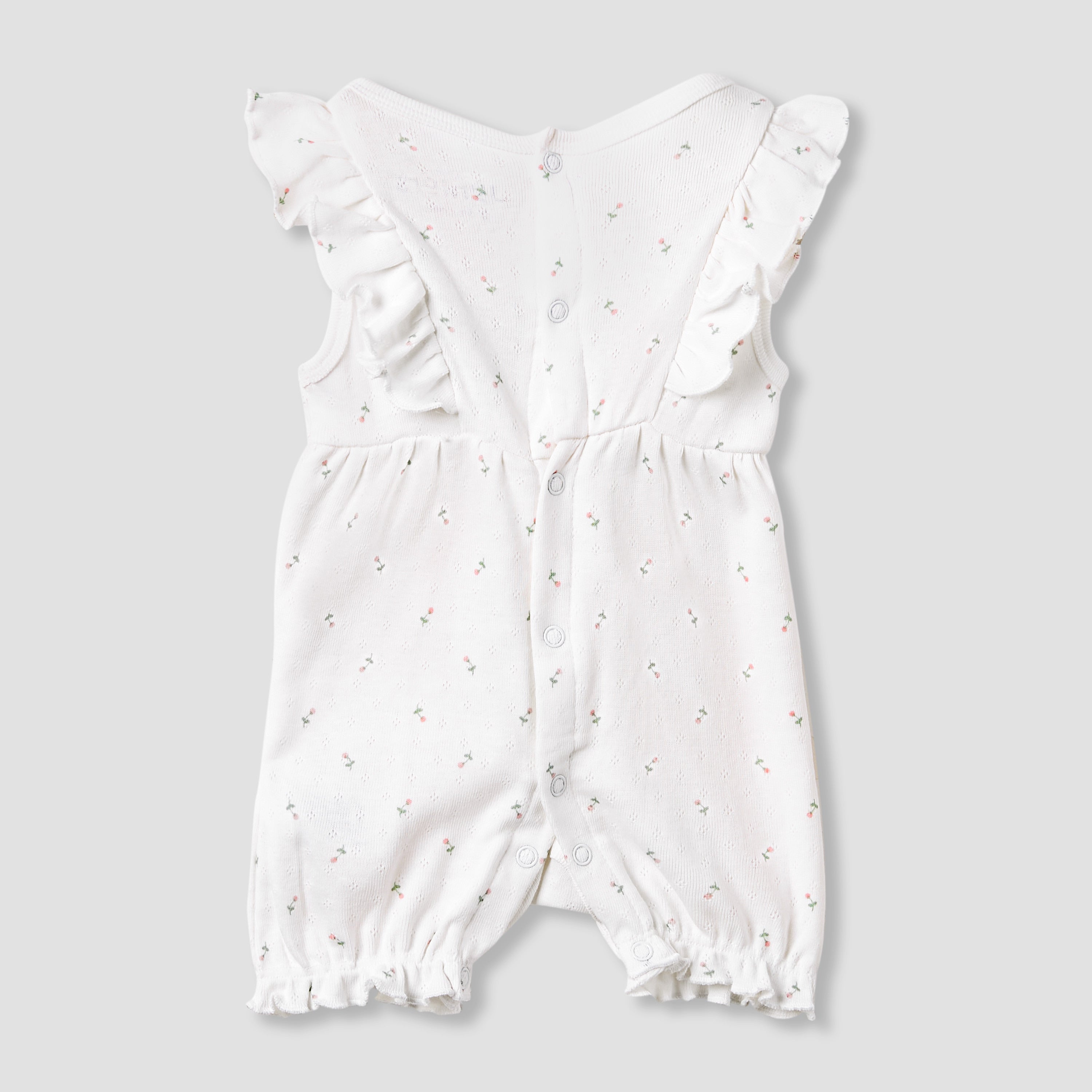 Juniors Printed Sleeveless Romper with Ruffle Accent