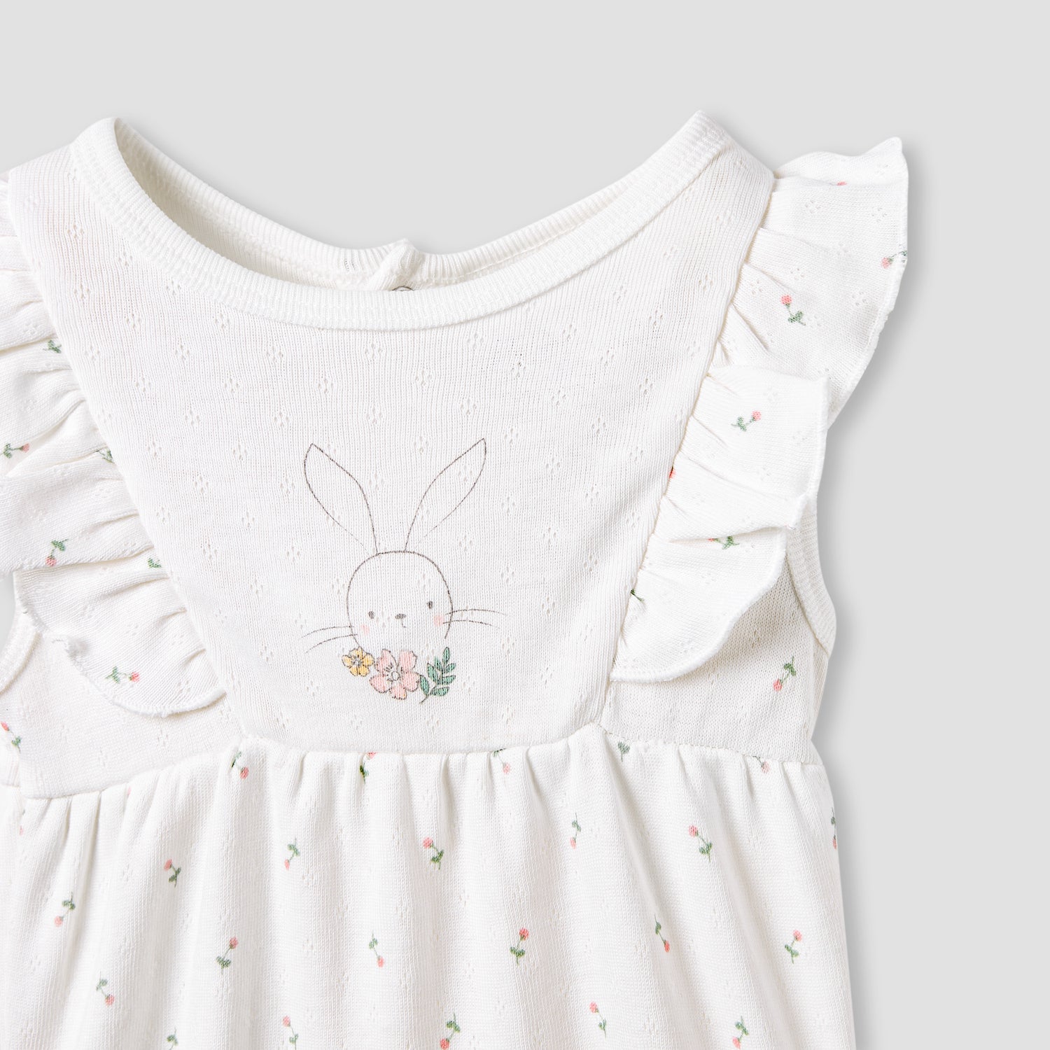 Juniors Printed Sleeveless Romper with Ruffle Accent
