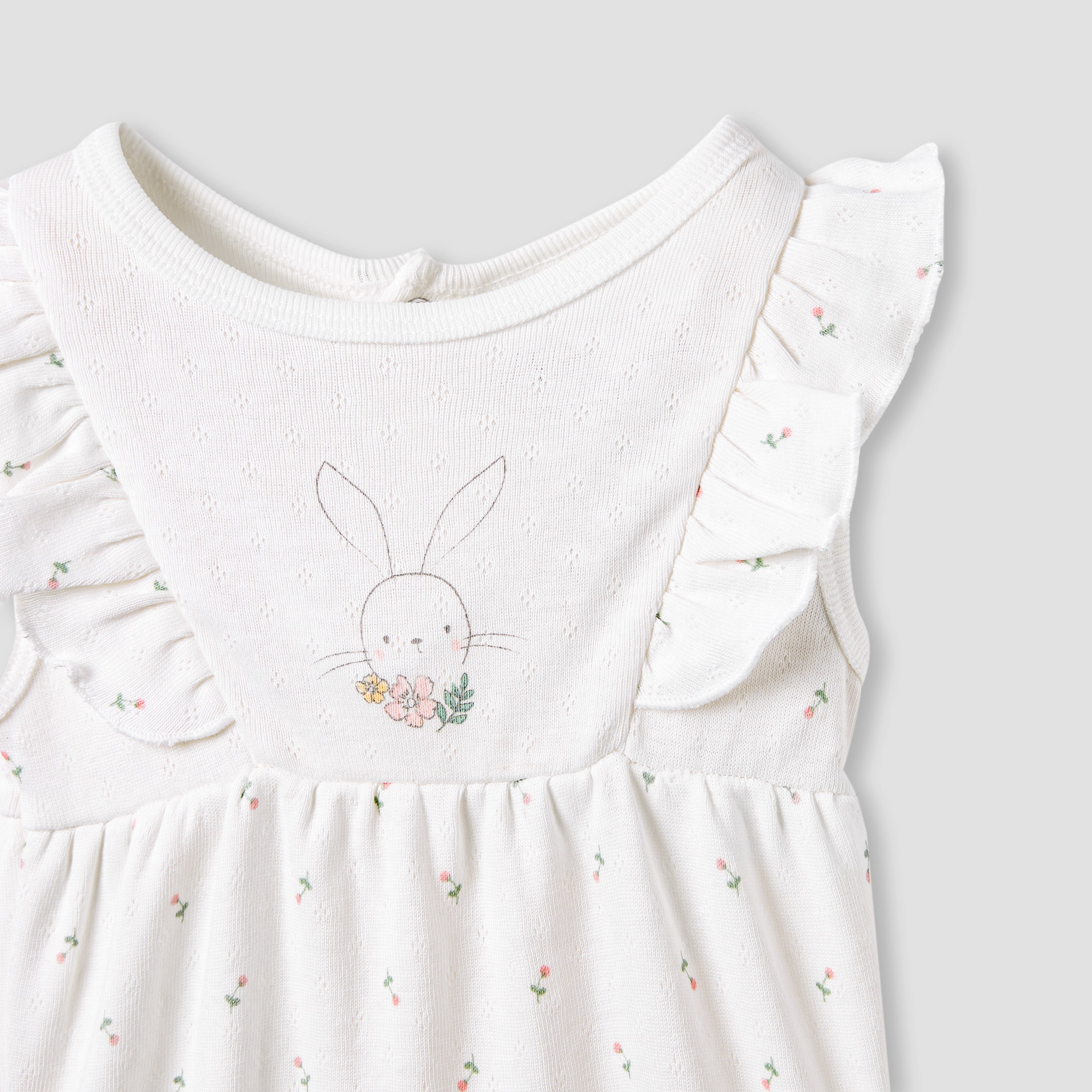 Juniors Printed Sleeveless Romper with Ruffle Accent