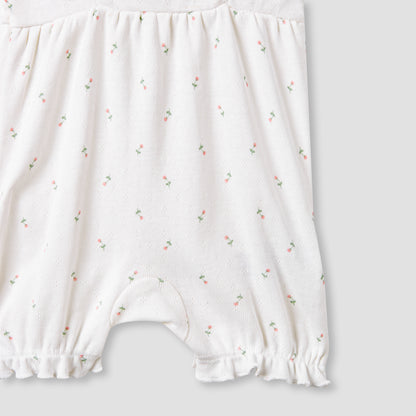 Juniors Printed Sleeveless Romper with Ruffle Accent