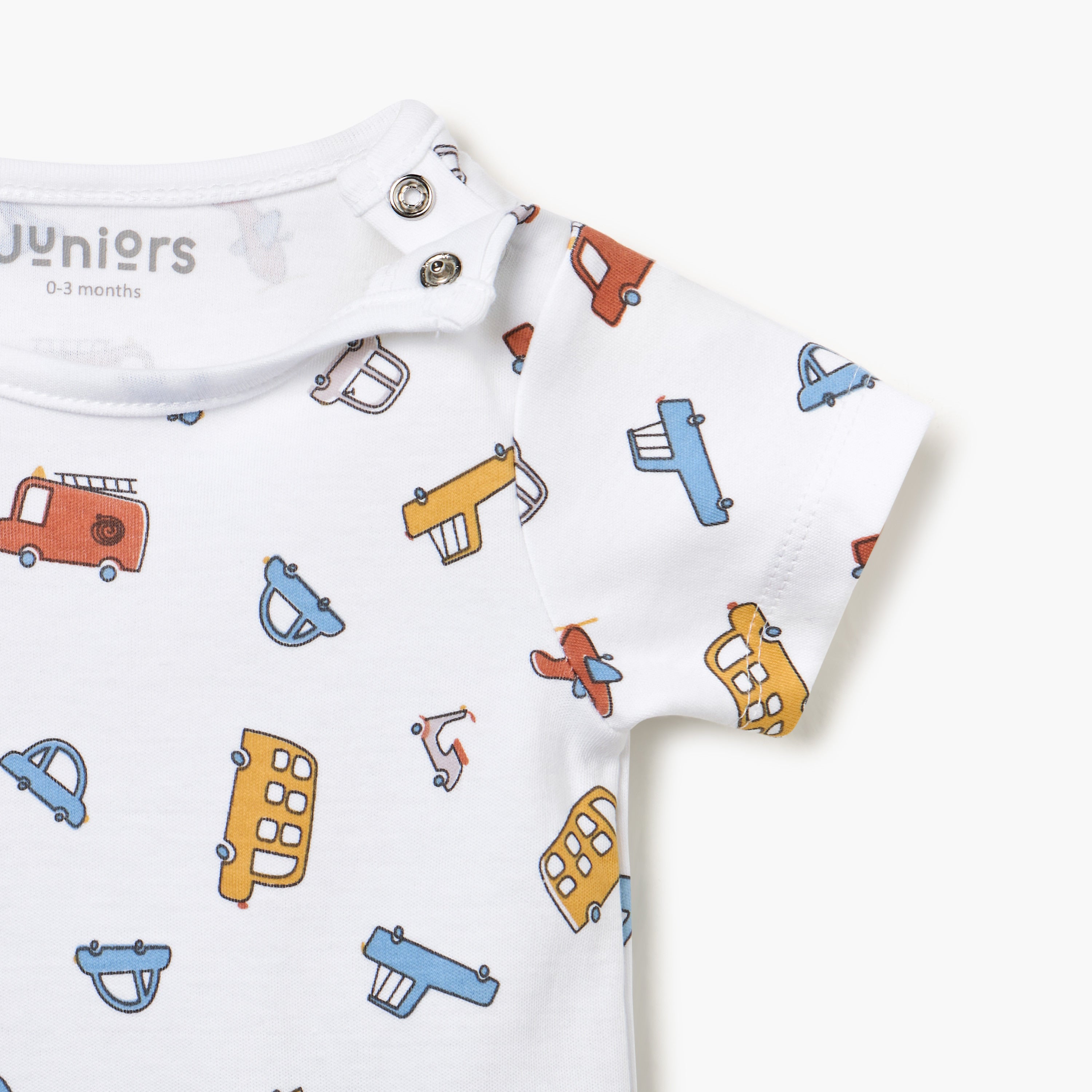 Juniors Vehicle Print Romper with Short Sleeves and Button Closure