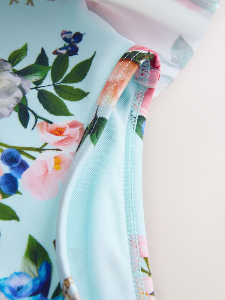 Baker by Ted Baker Mint Green Long Sleeve Peplum Frill Swimsuit