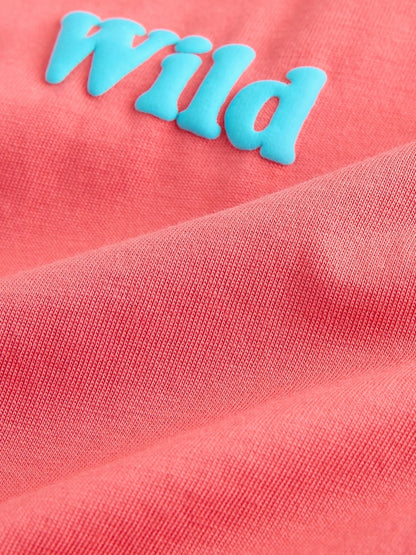 Coral Pink Wild Slogan